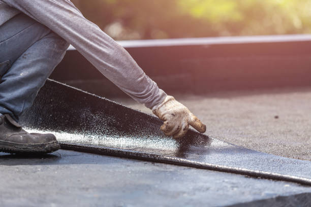 Professional Basement Waterproofing technician working in Lyons, IN